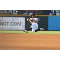 2B Jose Altuve makes a throw while falling for the Round Rock Express
