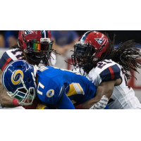 Defensive back Michael Knight with the Washington Valor makes a tackle against the Tampa Bay Storm