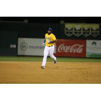 Jabari Henry of the Sioux Falls Canaries rounds the bases following his home run