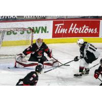 Prince George Cougars goaltender Taylor Gauthier makes a stop in close vs. the Vancouver Giants