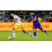 Shea Salinas of the San Jose Earthquakes with possession vs. Orlando City SC