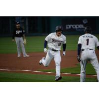 Tacoma Rainiers outfielder Jarred Kelenic rounds the bases following one of his home runs