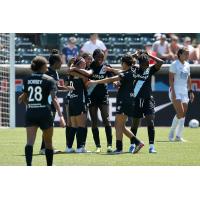 NJ/NY Gotham FC celebrate a goal against OL Reign