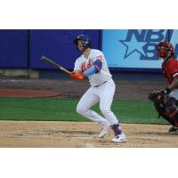 Brandon Drury of the Syracuse Mets watches his home-run ball fly over the left-field wall