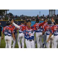 Pensacola Blue Wahoos celebrate a walk-off win