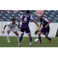 Louisville City FC midfielder Brian Ownby (right) and defender Wes Charpie vs. FC Tulsa