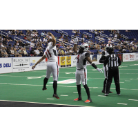 Jacksonville Sharks kicker Brandon Behr and receiver Jarmon Fortson