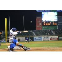 New York Boulders' Ray Hernandez connects for his 12th home run of the season against Equipe Quebec