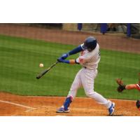 The Syracuse Mets' Chance Sisco connects with a ball that he hit for a three-run home run in the first inning on Friday night