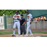 Steve Lombardozzi of the Long Island Ducks shares a laugh at first