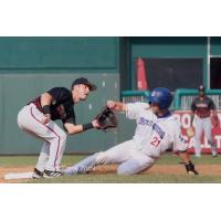 New York Boulders' Ryan Ramiz swipes second base in Sunday's game with the Washington Wild Things