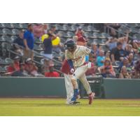 Charcer Burks of the Kansas City Monarchs rounds third after his second home run of the season