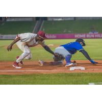 Kansas City Monarchs third baseman Darnell Sweeney tags out Houston's Alvaro Gonzalez at third base