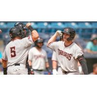 Justin Foscue of the Hickory Crawdads celebrates after a home run