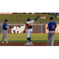 Romer Cuardrado of the Tulsa Drillers stands at second base after one of his two doubles in Friday's game