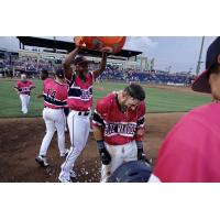 Pensacola Blue Wahoos serve a Gatorade shower after a walk-off win