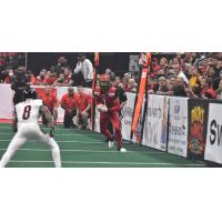 Jacksonville Sharks receiver Devin Wilson with the ball against the Orlando Predators