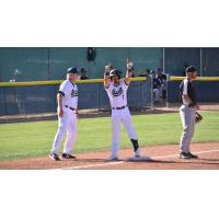 Northern Colorado Owlz infielder Kevin Higgins on third