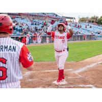 Ottawa Titans outfielder Rodrigo Orozco touches home