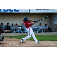 Ryan Jackson of the St. Cloud Rox takes a big swing