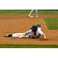 Trevor Austin of the St. Cloud Rox slides safely into third