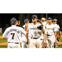 Fond du Lac Dock Spiders' manager Zac Charbonneau congratulating the team