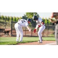 Northern Colorado Owlz exchange a low five