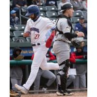 David Vinsky crosses home plate for the New York Boulders