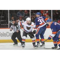 Lehigh Valley Phantoms' Jordy Bellerive versus Bridgeport Islanders' Jeff Kubiak and Seth Helgeson