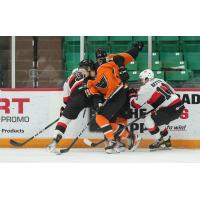 Lehigh Valley Phantoms' Tyson Foerster battles Belleville Senators' Dillon Heatherington and Kyle Betts