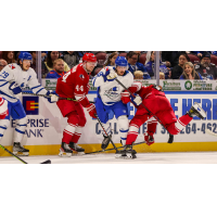 Wichita Thunder's Brayden Watts and Dillon Hamaliuk battle Allen Americans' Andrew Durhamon on game day