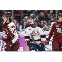 Saginaw Spirit's Roberto Mancini and Peterborough Petes' J.R. Avon and Chase Stillman on game day