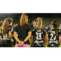 Racing Louisville FC huddle