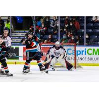 Kelowna Rockets left wing Turner McMillan in front of the Tri-City Americans' goal