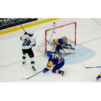 Winnipeg ICE's Conor Geekie battles Saskatoon Blades' Blake Gustafson and Austin Elliott