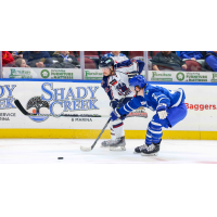 Wichita Thunder defenseman Jordan Muzzillo (right) vs. the Tulsa Oilers