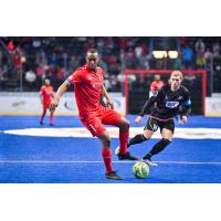 Kansas City Comets' Leo Gibson And St. Louis Ambush's William Eskay On The Field