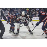 Owen Hardy of the Vancouver Giants battles Kamloops Blazers' Drew Englot