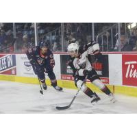 Kamloops Blazers' Daylan Kuefler and Vancouver Giants' Tyler Thorpe on the ice