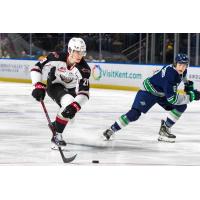 Vancouver Giants' Samuel Honzek and Seattle Thunderbirds' Bryce Pickford in action