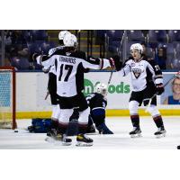 Vancouver Giants' Matthew Edwards and Dylan Anderson celebrate win