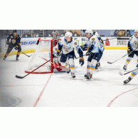 Toledo Walleye defend their goal against the Norfolk Admirals