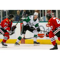 Texas Stars' Fredrik Karlstrom Battles Rockford Icehogs' Dylan Sikura And Cliff Watson