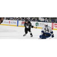 Ontario Reign's Jordan Spence and Colorado Eagles' Charles Hudon on game night