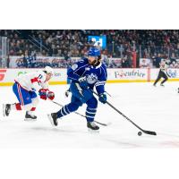 Syracuse Crunch forward Joel Teasdale controls the puck vs. the Laval Rocket