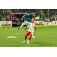 St. Louis Ambush go high for a ball against the Kansas City Comets