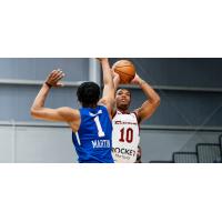 Darius Brown II of the Cleveland Charge shoots against the Delaware Blue Coats