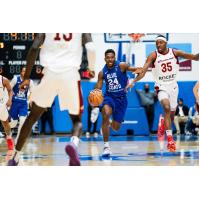 Delaware Blue Coats guard Aminu Mohammed hads up court against the Cleveland Charge