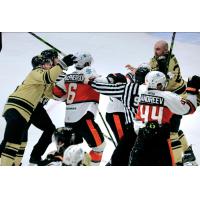 Kansas City Mavericks' Justin MacPherson and Maxim Andreyev battle the Wheeling Nailers