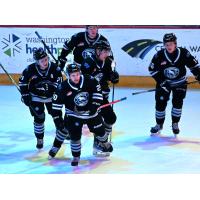 Wenatchee Wild forward Tye Spencer leads the line to the bench